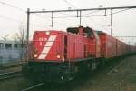 RailIoN 6518 with the since 2010 defunct Opel-train Bochum-Antwerpen speeds through Tilburg on 18 March 2003.