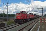 Mixed freight toward Belgium, headed by 6505, speeds through Lage Zwaluwe on 24 August 2018.