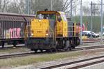 DBC 6461 runs light through Lage Zwaluwe on 23 July 2019.