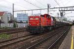 On 15 May 2026 ex-NS 6463 hauls a zinc ore train to Budel (NL) through Antwerpen-Berchem.