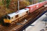 Opel train with 266 452 passes through Arnhem Centraal on 24 August 2005.
