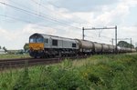 Tank train with 266 041 thunders past Horst-Sevenum on 18 July 2016.