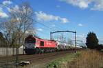 Crossrail Benelux DE 6311 hauls a block train through Hulten on 23 February 2022.