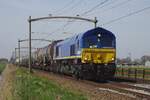 Hauling a tank train RailTraxx/Beacon Rail 266 009 passes through Hulten on 15 April 2023.