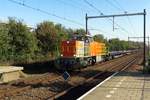 RTS 1018 hauls an empty engineering train through Tilburg-Reeshof on 5 November 2020.
