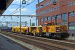 Strukton 303008 shunts with a maintenance train on 25 June 2020 at Amersfoort.