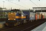 In the last light of 29 November 2006 ACTS/HUSA h7102 hauls a container train through Lage Zwaluwe.