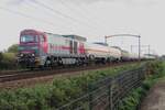 IRP 2105 hauls an LPG tank train through Tilburg-Reeshof on a short grey moment on 15 October 2021. IRP is a daughter operator of Lineas.