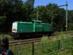 Captrain 101 awaits the entering of Crailoo on the main tracks Bussum-Hilversum to pick up a prorail-Kls-train with a collegue well captured (but his head whitout a cap...) by this sight 23.7.12