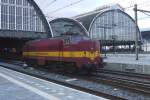 Ex-ACTS 1254 running light through Amsterdam Centraal on 30 March 2013. Note the ACTS-logo on the nose of the loco.