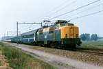 Hauling an international overnight train, NS 1206 speeds through Liempde on 22 Augustus 1993.