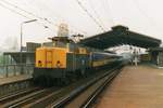 NS 1210 speeds through Rotterdam Blaak on 27 November 1993.