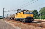 On 24 July 1993 NS 1302 hauls a tank train through Assen.