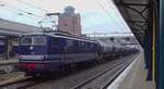 On a grey afternoon of 13 April 2022 FairTrains 1315 (in 1950s colours, but with the 1990s modifief head lights) hauls a tank train through s'-Hertogenbosch toward Eindhoven.