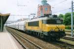 Chalk train, headed by 1601, passes 's Hertogenbosch on 18 April 2005.