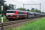 RailLogix 1619 hauls a block train through Dordrecht Zuid on 23 July 2016.