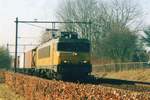 RaiLioN 1614 hauls a container train through Wijchen on 1 March 2003.