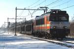 RFO, ex-LOCON 1837 hauls a Gefco automotives train through Alverna on 11 February 2021.