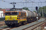 On 20 July 2019 RF 4401 hauls an oil train through Barneveld Noord.
