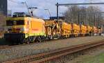 Strukton 1824 hauls an engineering train through Wijchen on 1 March 2024.