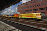 Strukton 1824 stands with a maintenance train at Amersfoort on 25 May 2021.