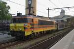 RRF 43401 hauls a rake of empties through Tilburg on the evening of 23 July 2016.
