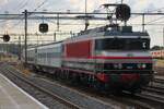 RXP 9904 stands with some RADVE coupling wagons used for transport moves of new EMUs at Amersfoort on 1 August 2026. Netherlands State Railways NS bought French in 1981 with an order for 58 nez-cass�es (Broken Noses) to become Class 1601-1658. Whem the NS loco fleet was sectorised in 1999/2000,NS Cargo (later RaiLioN,then DB Schenker RN,then again DB Cargo) received the first batch of the class 1601-1622, that remained their numbers. NS reizigers,responsible for the passenger traffic,received 1623-1658 and renumbered them into the 1800-series, since Class 1700 already was their and to seperate the identity of their own locos with/against those of NS Cargo. After NS and later DBSRN/DB Cargo NL discarded their 1600s/1800s, private operators were quick to pick up a few locos,somethimes retainingthe 1600/1800 numbers, but sometimes giving them new numbers (RRF 4401 and 4402 and LOCON Benelux 9901-9910).
 This engine started life as NS 1618 until decommmissioned, after which Railogix bought the machine, giving her this SNCF Multiservice inspired livery. In 2020 Railogix stopped her operations and stored the loco at Amersfoort. One year later LOCON Benelux went bankrupt and their Class 9900s went everywhere, mostof them becoming assets of RFO. But not this 9904, since LOCON's own 9904 was another machine,reverting to her number 1831 after havingbeen bought by RFO. So Classes 1600 and 1800 are identical, but the one 9904 is not the other... because RXP bought LOCON's  9901,theydecided to number subsequent locos of this Class into their 9900s. Complicated? Absolutely not, just nigh impossoble to follow...