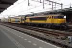 Double deck regional stock with 1748 stands at Deventer on 19 April 2018.