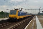 NS 186 111 hauls an intercity to Bruxelles-Midi and passes Lage Zwaluwe on 23 July 2016.