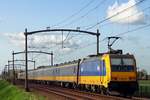 NS 186 021 banks a passenger train through Hulten on 4 November 2020.