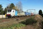 BLS 186 109 hauls a container train through Hulten on 21 Febraury 2021.