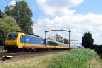NS 186 031 hauls an IC-Direct train through Hulten on 9 July 2021.