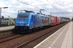 On 7 July 2021, LTE 186 945 hauls an intermodal train through Tilburg-Reeshof.
