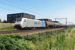 Lineas 186 510 hauls the Silesia-express through Tilburg-Reeshof on 23 July 2021.
