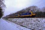 NS 186 114 hauls an IC-Direct through a snowy Tilburg Oude Warande on 24 January 2019.