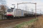 Railpool 186 498 hauls a tank train through Hulten on 23 February 2022.