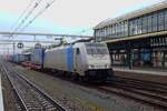 Retrack 186 538 passes through 's-Hertogenbosch on a rainy 10 April 2022.