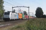 Lineas 186 296 hauls a container train through Hulten on 2 September 2022.