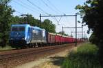 LTE 186 942 hauls a cereals train through Wijchen on 31 May 2023.