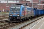 With a rake of PKP Cargo Eanos-wagons, HSL 186 381 halts at Amersfoort on 27 April 2023.