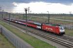 On 18 March 2012 FYRA 186 118 speeds through Lage Zwaluwe on the high sped line toward Rotterdam. The FYRA brandings, the deployment of Class 186 with NS Reizigers and the ICR coaches are all gone now.