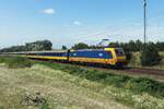 On 23 July 2021 NS 186 119 hauls an IC-Direct through Tilburg Reeshof.