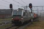 On a hazy 18 November 2024 SBBCI 193 108 hauls a containertrain through Boxtel toward Venlo and K�ln-Eiffeltor.