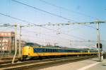 NS 4082 is about to call at 's Hertogenbosch on 15 April 2005. Note the bent catenary mast just in front of the EMU! 