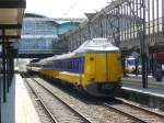 A three and a four coach unit ready to leave Utrecht Centraal Station on 16-07-2009.