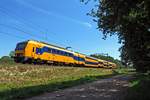 On 24 June NS 7534 speeds through Tilburg Oude Warande.