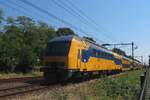 NS 7618 passes through Oss on 9 June 2023 with a fast train to Zwolle.