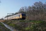 Le NS 7538 sale traverse Tilburg Oude Warande le 18 mars 2026.