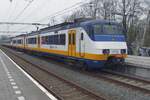 Op een regenachtige 12 december 2019 staat NS 2125 klaar voor vertrek in Wijchen.