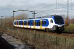 NS 2224 speeds past Tilburg-Reeshof on 24 January 2021.